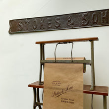 Load image into Gallery viewer, 1920's ‘Stokes & Sons’ Outfitters Shop Sign & Shop Paper Roll
