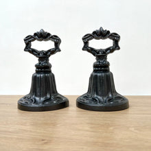 Load image into Gallery viewer, Pair of Antique Cast Iron Kenrick Door Porters
